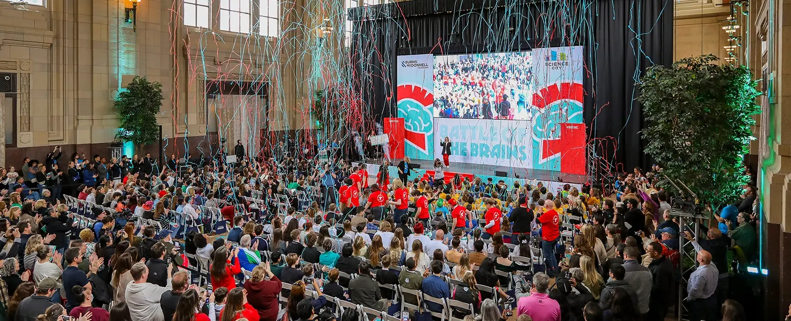 View of crowd and stage in Union Station during announcement of the 2026 Battle of the Brains competition winner