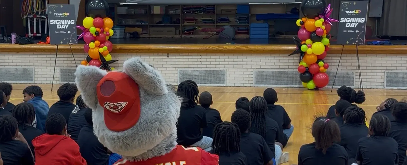 Team Up for Math event at Center Elementary, including students and KC Wolf