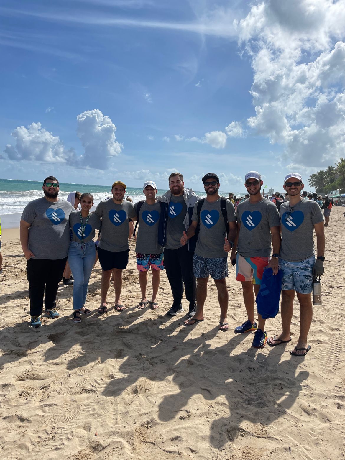 Team photo at beach cleanup