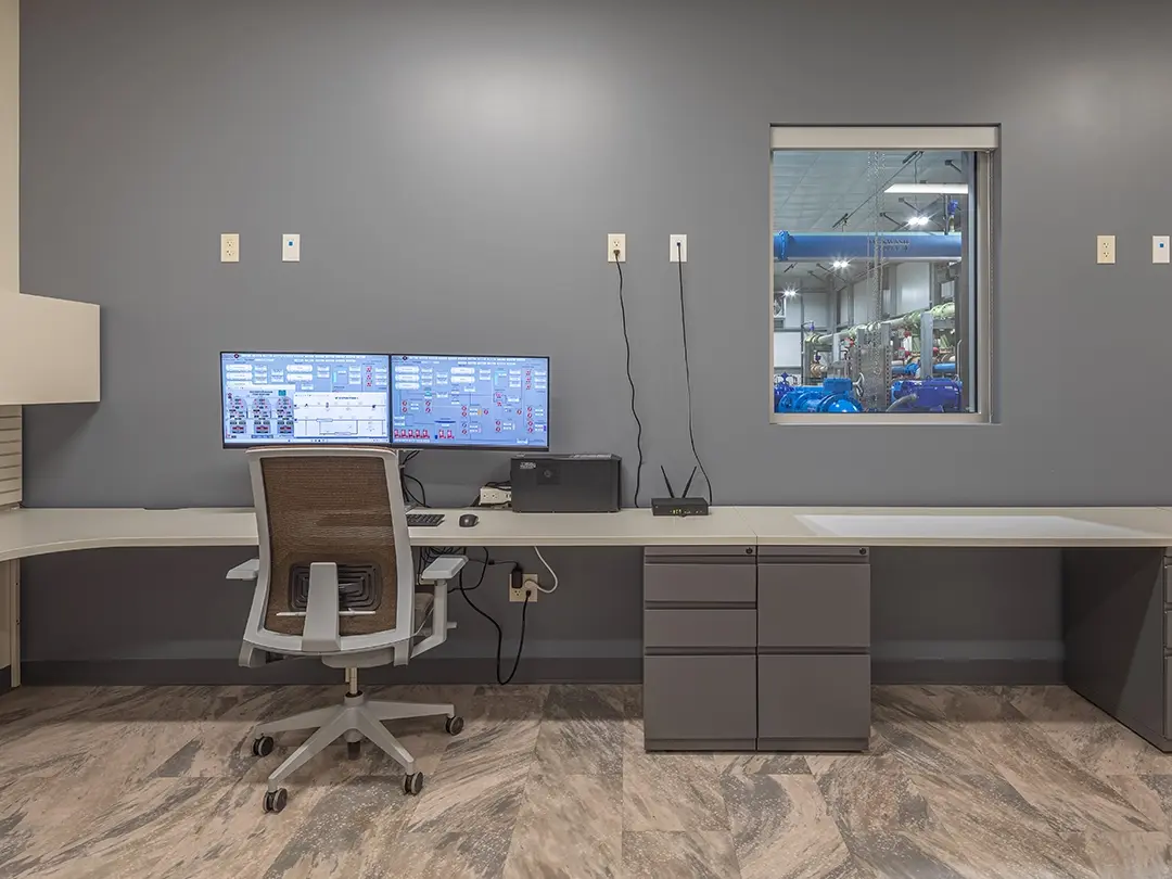 interior desk space with window to treatment works