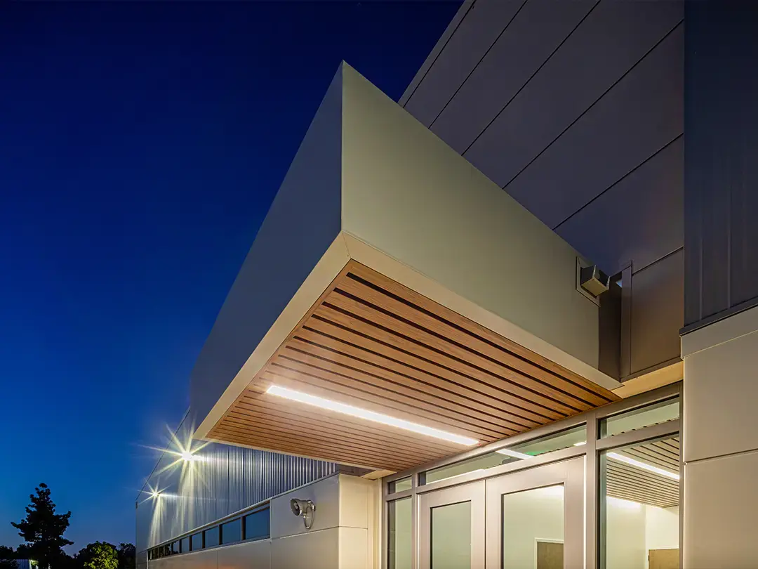 exterior building entrance overhang at night 