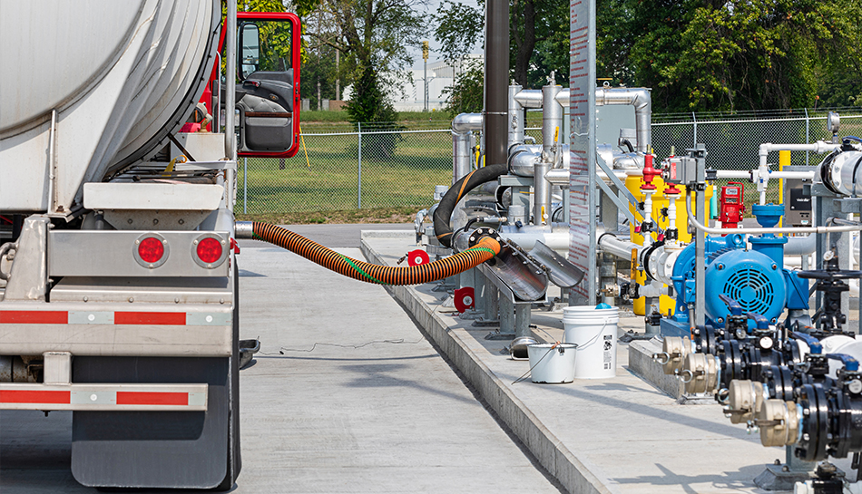 truck dispensing fuel to system