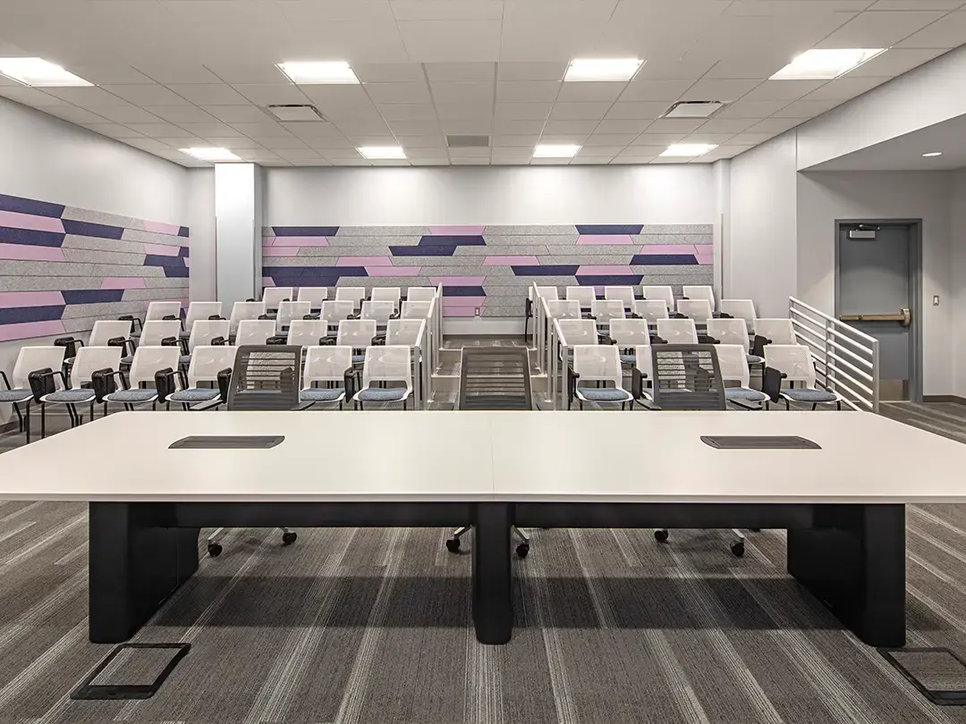 mid-size training room with graduated seating and presentation table