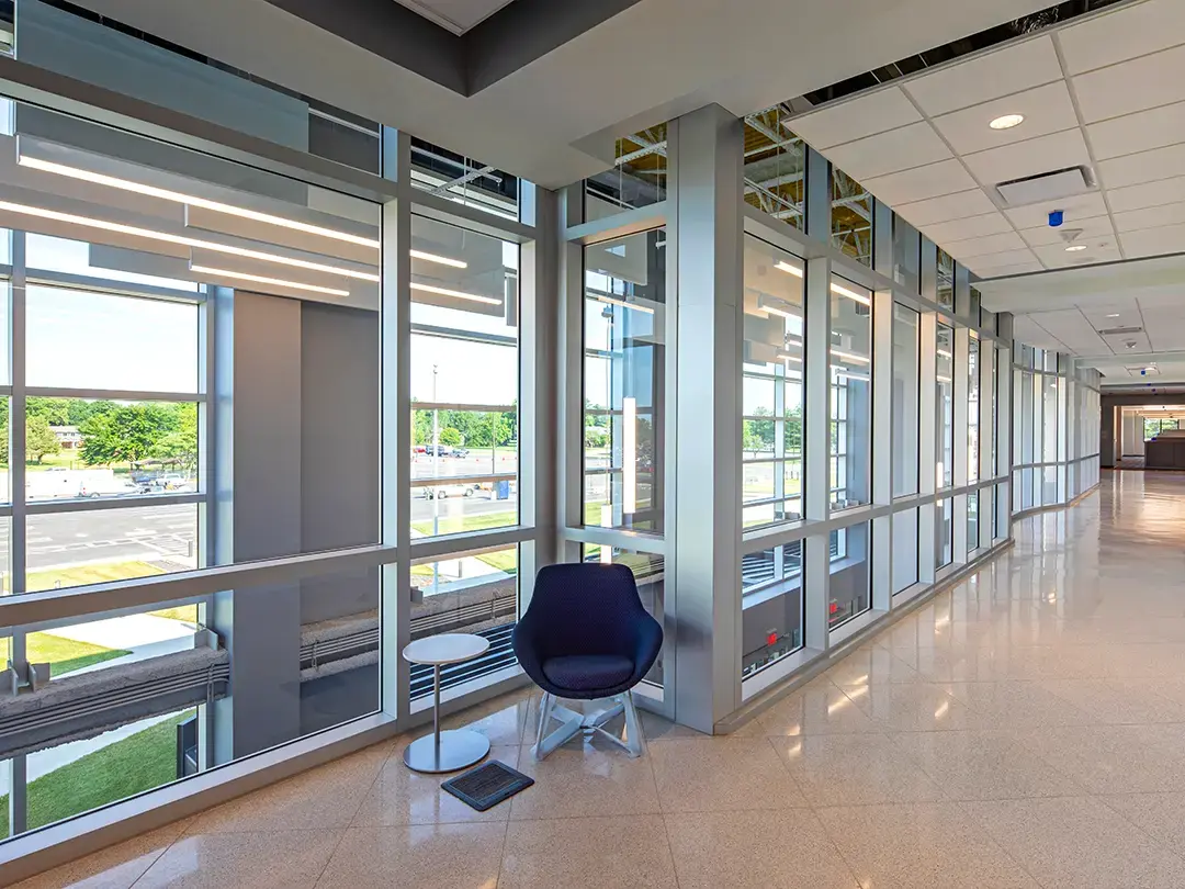 walkway seating with view to first floor and outside parking areas