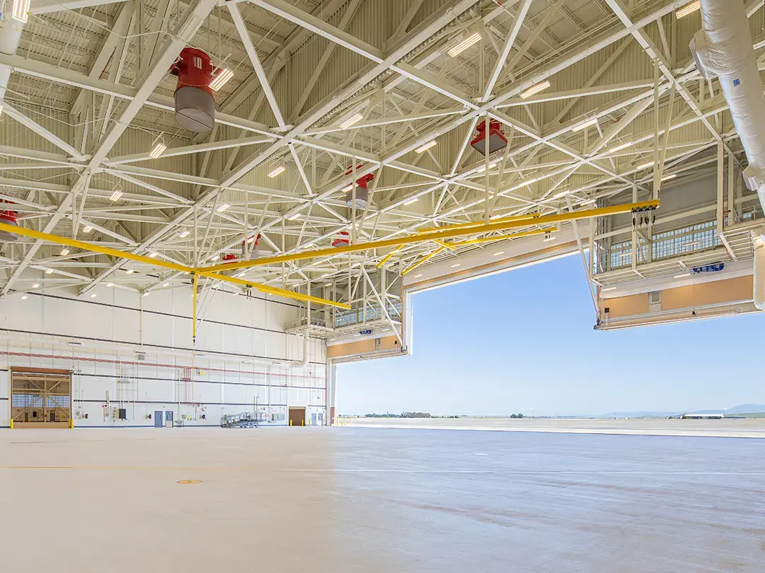 interior view of hangar looking toward open bay doors