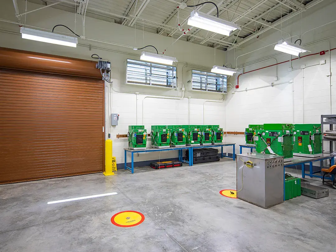interior room with bay door and equipment