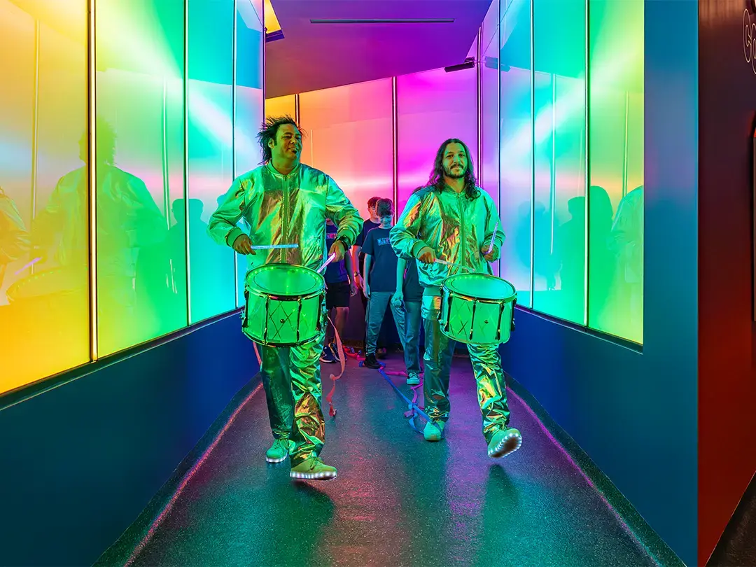 drummers lead winning team students into newly opened exhibit