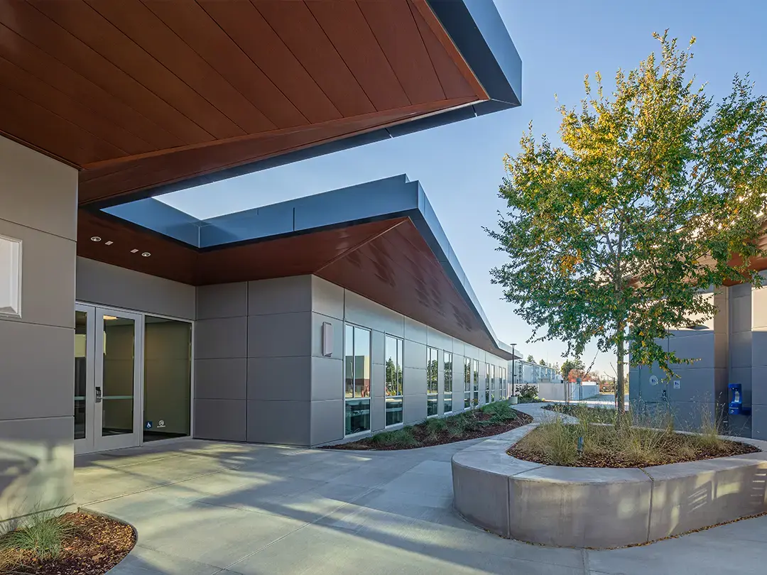 building exterior entrance with awnings and planter