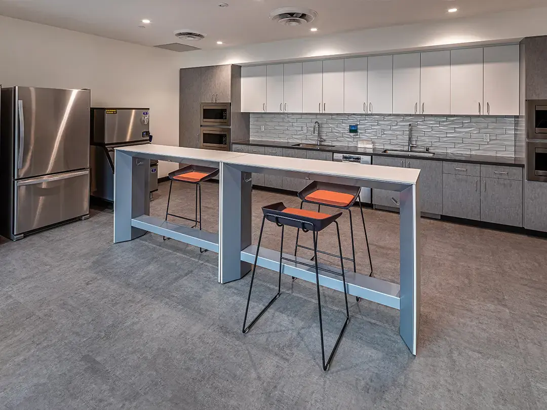 office kitchen area with bar seating
