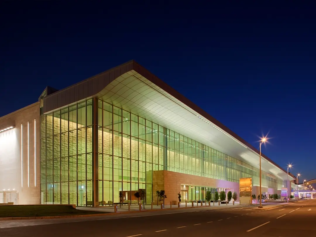 exterior of convention center entrance at night