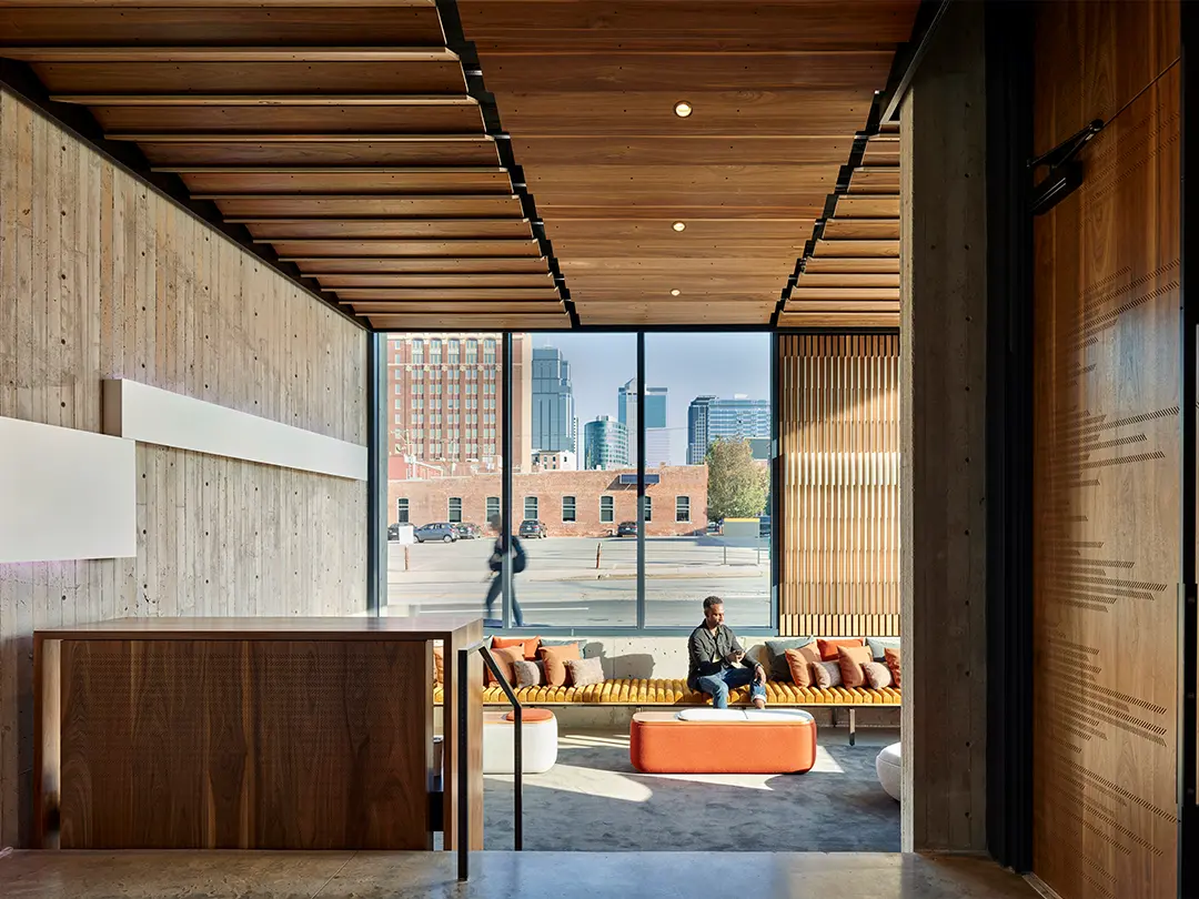 interior view looking through lobby seating toward street