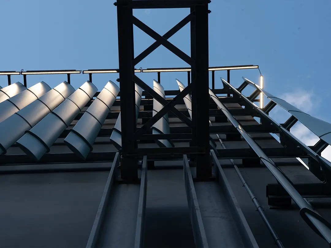 view from below of slats on exterior of substation enclosure