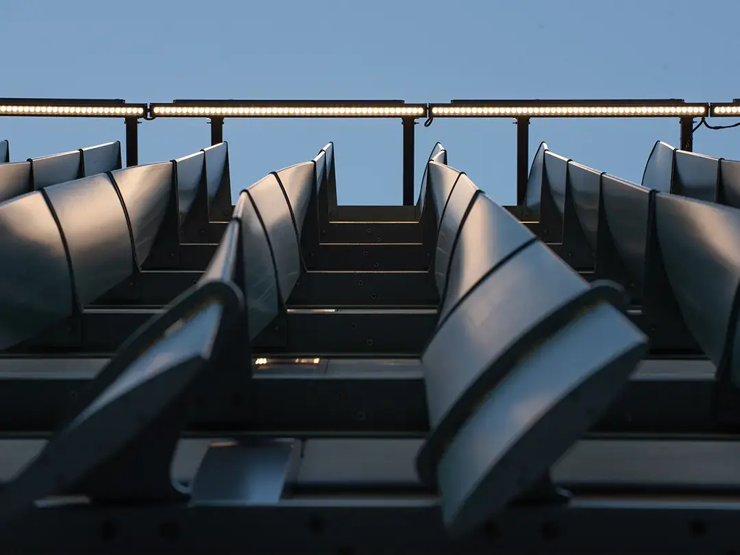 closeup view from below of exterior slats on substation enclosure