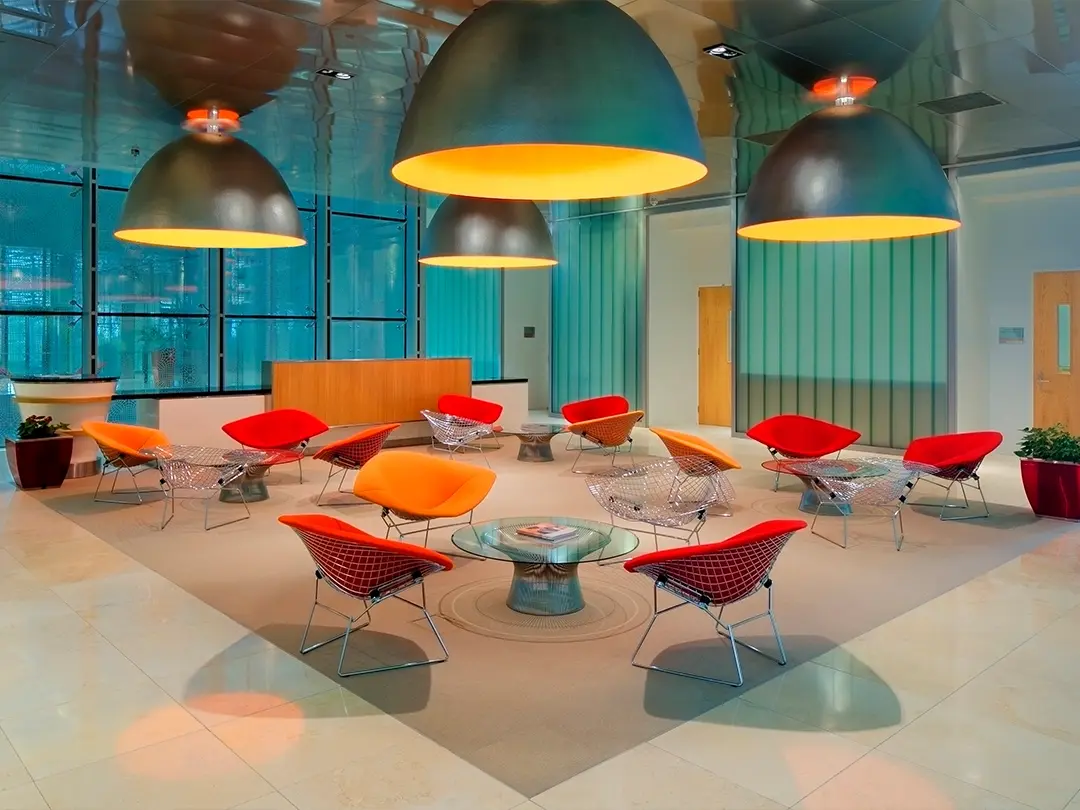 public gathering space with modern furniture and overhead lighting