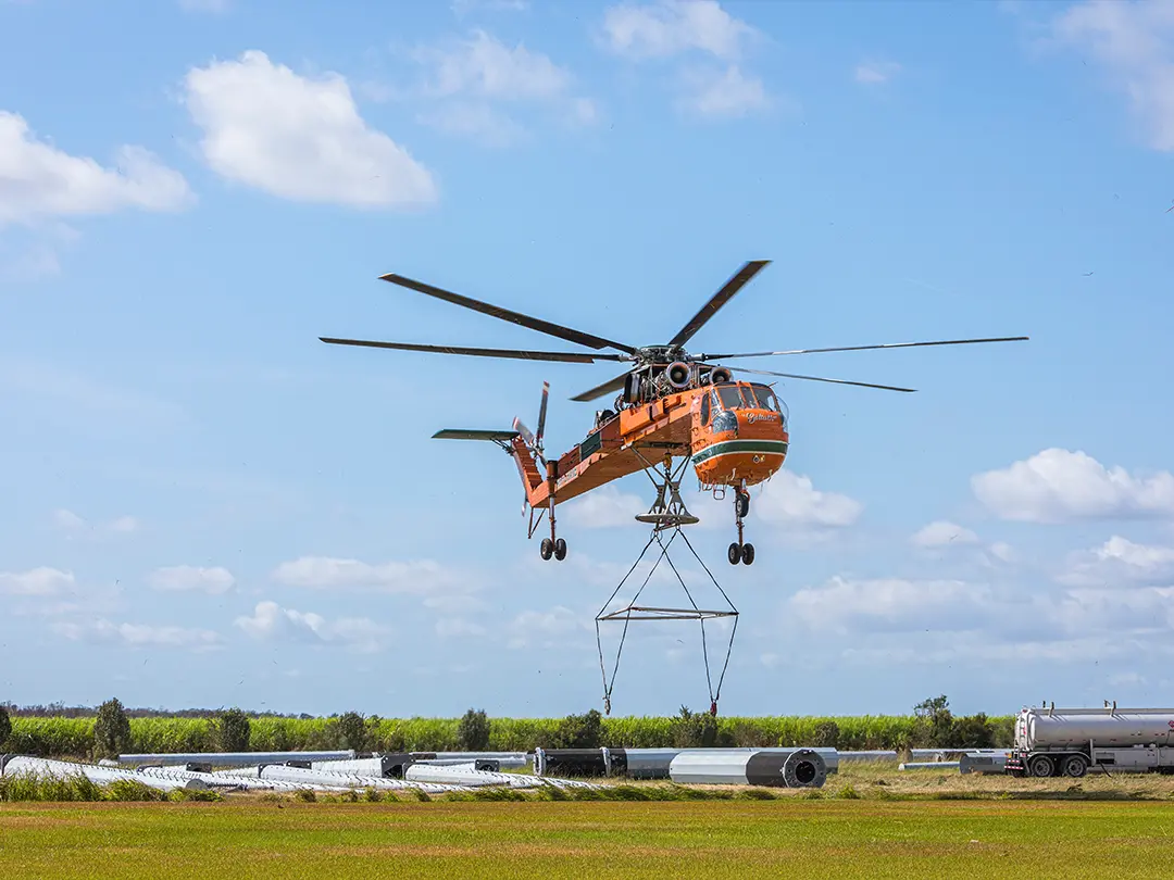 helicopter lifting transmission tower steel poles