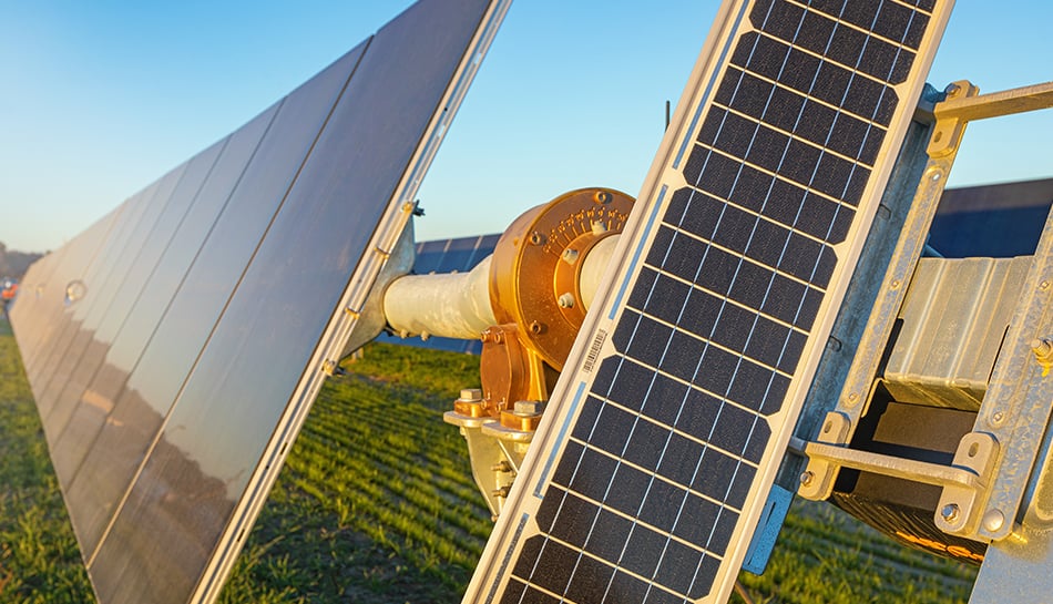 closeup view of installed solar panels with rotating joint