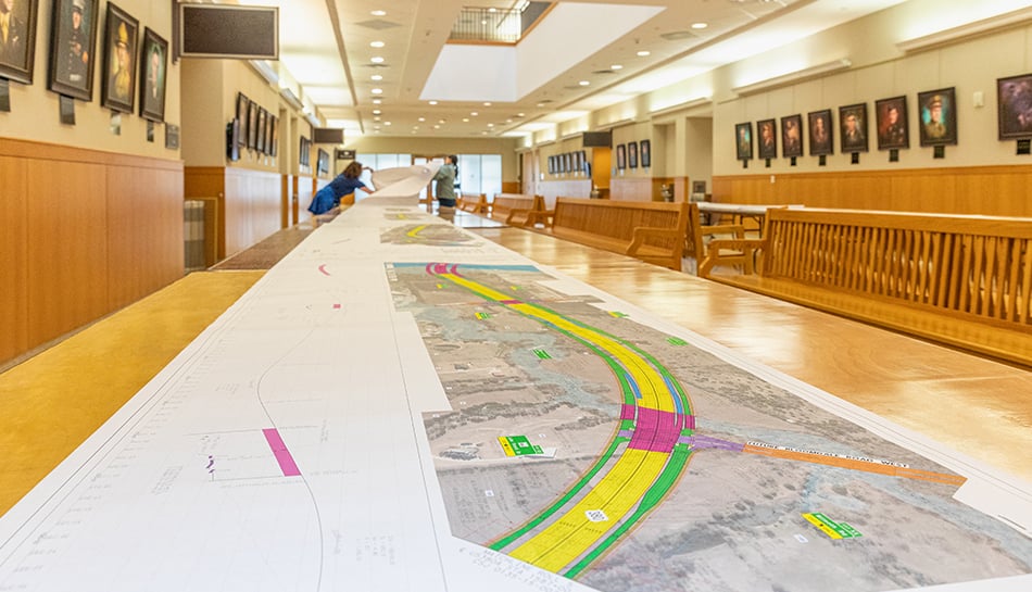 long perspective view of plans available for public viewing at meeting