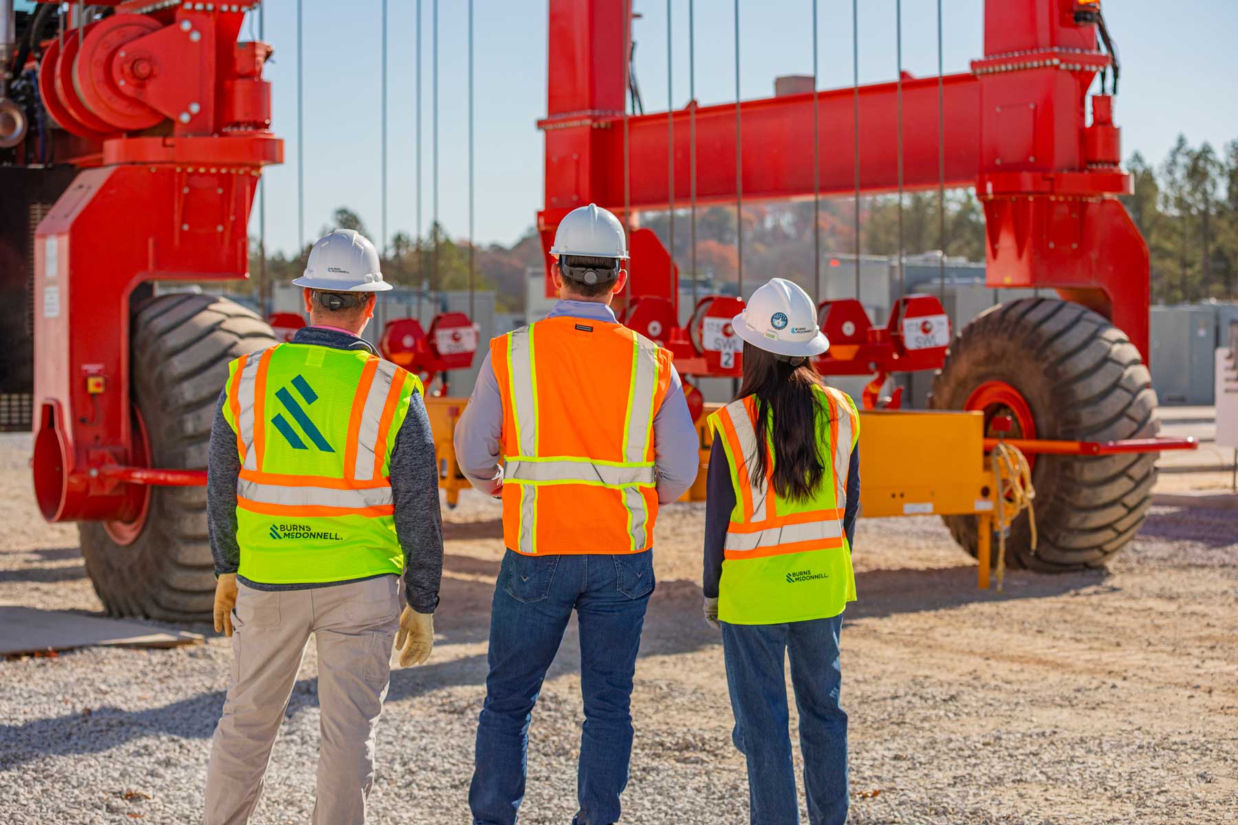 Three construction workers on site